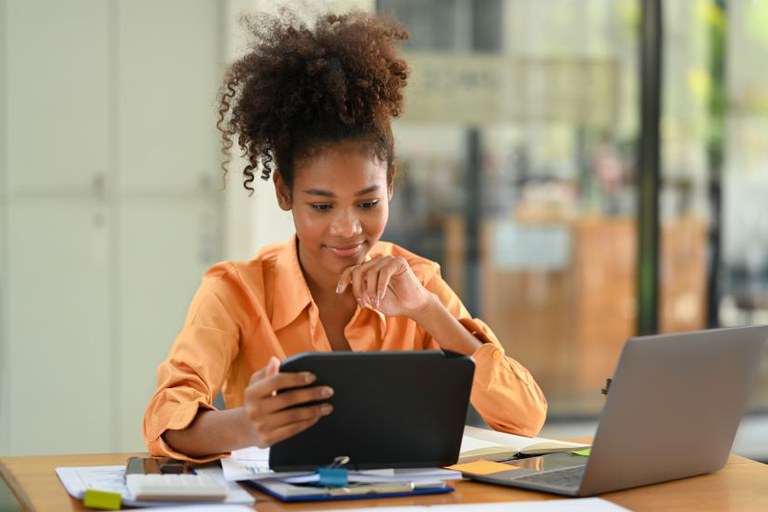 african-american-woman-employee-using-digital-tabl-2023-02-21-02-06-38-utc.JPG