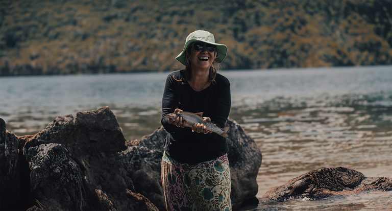 woman-holding-fish-hot-sunny-day2 (4).png