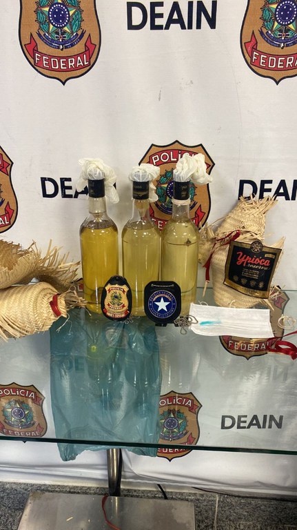 droga escondida em cachaça rj.jfif