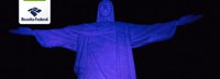 Em cerimônia especial, Cristo Redentor é iluminado de azul em homenagem ao 53º aniversário da Receita Federal