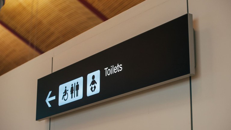 toilet-sign-direction-airport.jpg