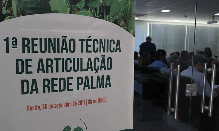 Banner do evento, onde está escrito "1ª Reunião Técnica de Articulação da Rede Palma - Recife, 26 de setembro de 2027 - 8 às 16h30". 